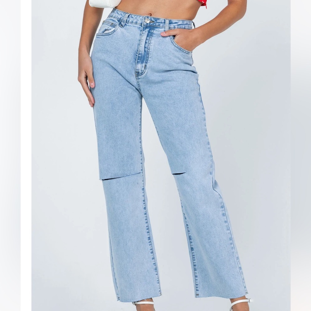 Light blue ripped jeans
